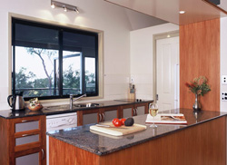 Panoramic views from the spacious granite and timber galley kitchen
